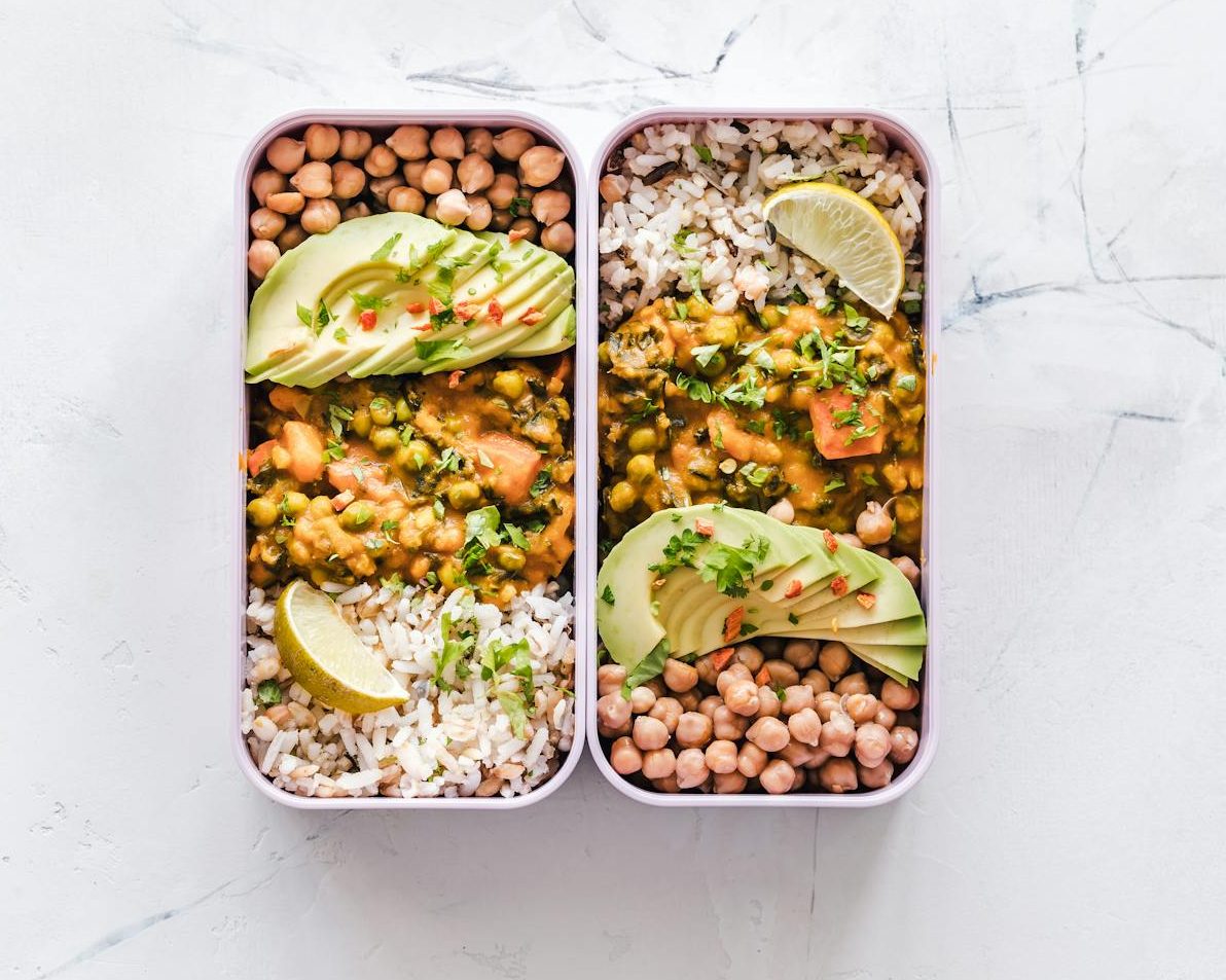 Flat Lay Photography of Two Tray of Foods